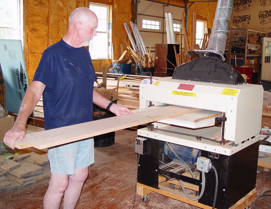Besides his Woodmaster Drum Sander, Charles owns a Woodmaster Molder/Planer, shown here. Between these two tools, he has everything he needs to turn roughcut lumber into finished trim and molding. And that's exactly what he did.