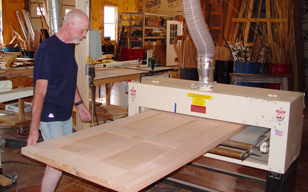 Charles ran full size doors -- 76 of them! -- through his 50" wide Woodmaster Drum Sander.