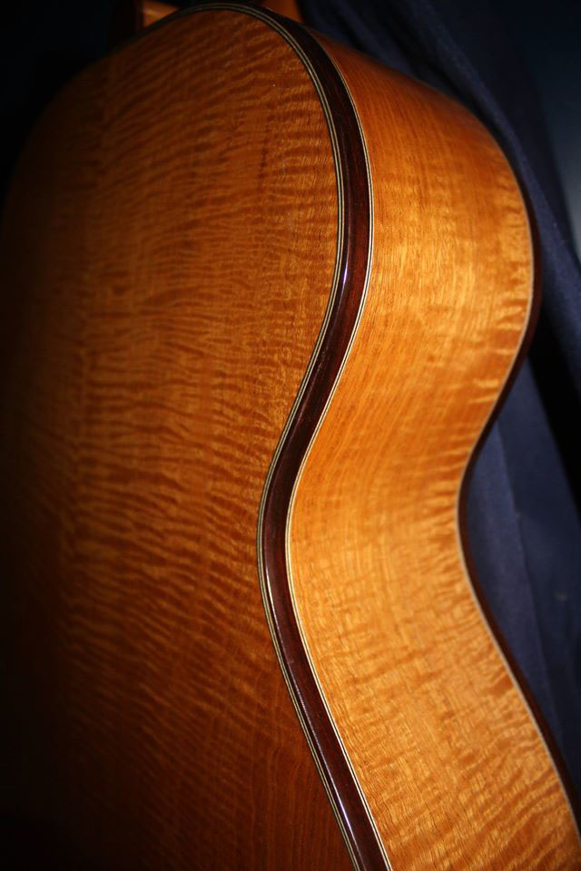 "I made this jumbo-body guitar from Flamed Honduran mahogany with rosewood binding," says John.