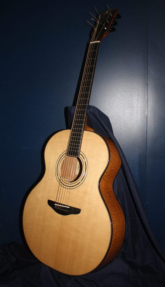 Flamed Hondouran mahogany guitar with Sitka spruce top.