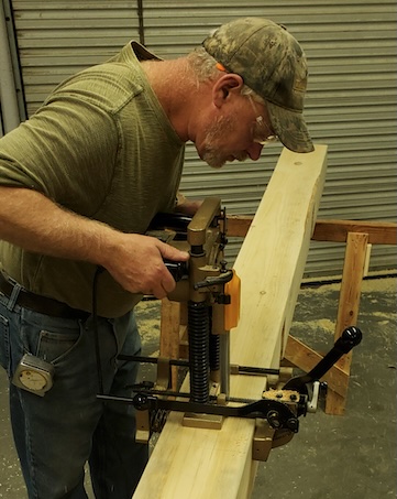 Tim mortising one a beam